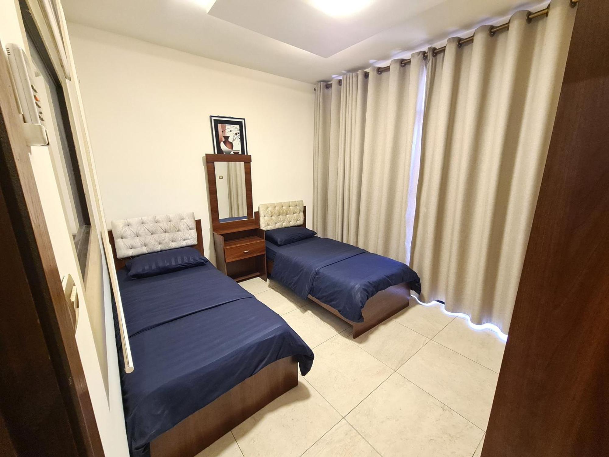Dair Ghbar Gate Apartments Амман Номер фото